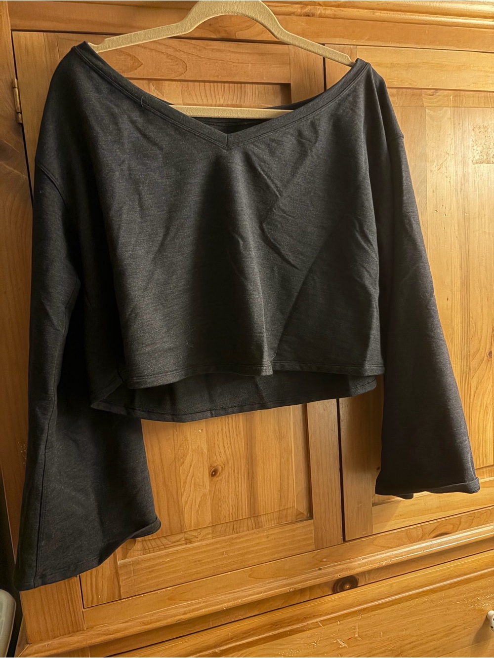 lululemon athletica Black Cropped V‑Neck Sweatshirt with Flared Sleeves